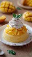 Mango dessert with whipped cream and fresh fruit served on a wooden table during afternoon tea photo