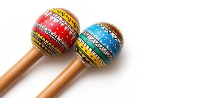 Colorful hand-painted maracas demonstrating vibrant cultural art from Latin America photo