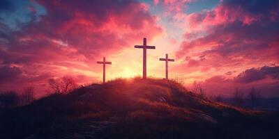 Sunset over three crosses on a hilltop surrounded by vivid clouds and soft light photo