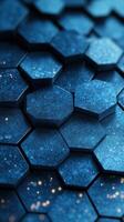 Detailed view of interlocking hexagonal patterns in deep blue shades with subtle sparkle effects creating a modern, abstract design photo