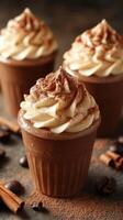 Delicious chocolate mousse topped with creamy whipped frosting and cocoa powder in cozy cafe setting photo