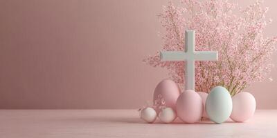 Decorated pastel eggs and a white cross with spring flowers in a soft pink setting for Easter celebration photo