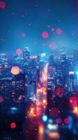 City skyline illuminated at night with vibrant lights and bokeh effects during a clear evening photo