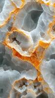 Beautiful layers of orange and white quartz creating a striking natural pattern in rock formation photo