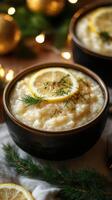 Creamy lemon risotto garnished with fresh herbs served in a festive setting photo