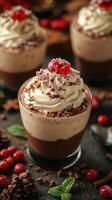 Indulgent dessert featuring rich chocolate mousse topped with cream and cherry photo