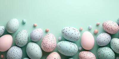 Decorative Easter eggs arranged on a mint green background for festive celebrations and spring festivities photo