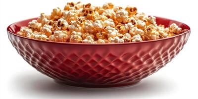 Freshly popped popcorn served in a vibrant red bowl against a plain backdrop photo