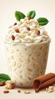Creamy dessert cup topped with whipped cream, nuts, and fresh mint leaves on a light background photo