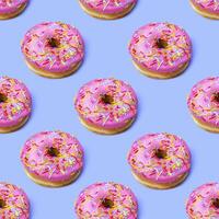 Flat lay donuts seamless pattern photo