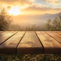 An empty wooden table in front of a sunset photo