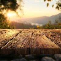 An empty wooden table in front of a sunset photo