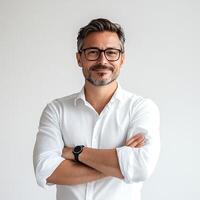A man with glasses and a white shirt photo