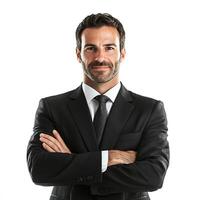 A man in a suit and tie standing with his arms crossed photo