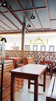 Wooden chairs and tables in the cafe. photo