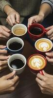 Group of people holding cups of coffee photo