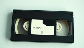 Black VHS Cassette Tape on White Background photo