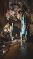 Hiker in the loftsalahellir cave near the village of vik in iceland photo