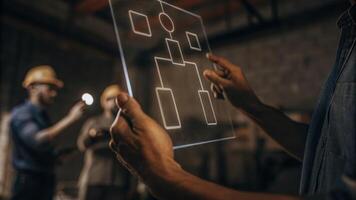 A closeup of hands manipulating a holographic diagram that represents an organizational structure with workers in the background evaluating the changes.. photo