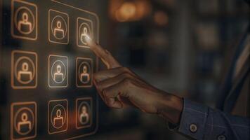 A hand reaching towards a holographic screen filled with talent acquisition statuses with glowing icons indicating successful hires interviews and pending applications.. photo