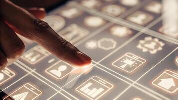 A closeup of an interactive interface where a users fingers trace over glowing performance benchmarks with icons representing different departments and their corresponding KPIs.. photo