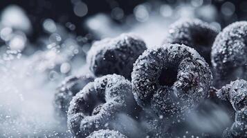 Close-up of frosted blackberries with a misty background. photo