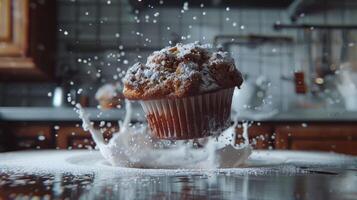 A cupcake splashes into a plate, creating a dynamic scene with flying droplets. photo