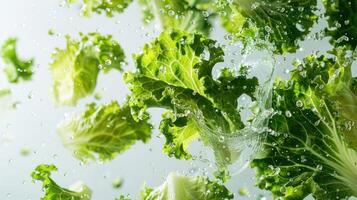 Fresh lettuce leaves splashing in water, emphasizing freshness and vitality. photo