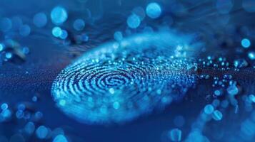 A close-up of a blue fingerprint surrounded by water droplets, emphasizing identity and security. photo