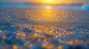 A close-up view of shimmering sand at sunset, capturing a tranquil beach atmosphere. photo