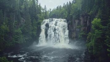 A majestic waterfall cascading into a serene pool, surrounded by lush greenery and trees. photo