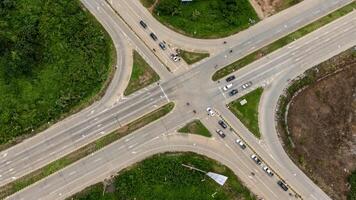 High angle view of road intersection in the suburb area of Chiang Rai province of Thailand. photo