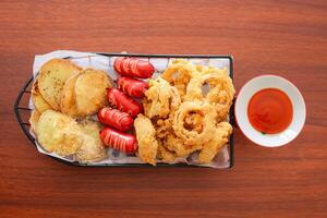 A tray of food on a table photo