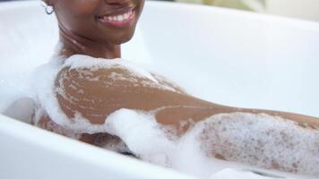 Enjoying a Relaxing Bath Time A Woman Indulges in a Soothing and Peaceful Soak for Ultimate Comfort video
