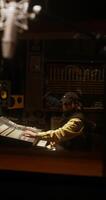 A man sitting at a desk in a recording studio video