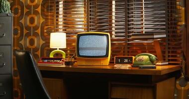 A desk with a computer, a lamp and a chair video