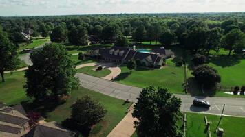 An aerial view of a large house and driveway video