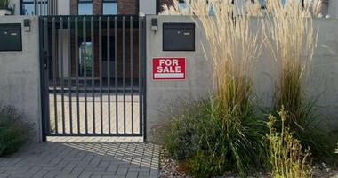 A fence with a sign on it video