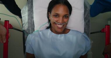 A woman in a hospital bed with an oxygen mask video