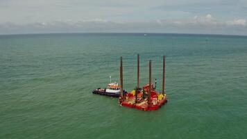 A small boat is in the middle of the ocean video