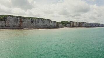A view of the beach and cliffs from above video