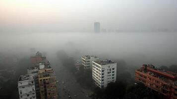 densely populated city shrouded in thick smog, obscuring buildings photo