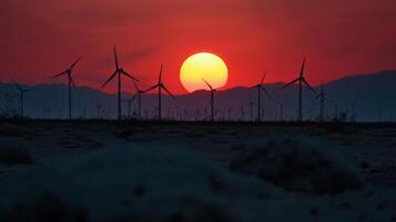 Wind turbines at sunset in the desert photo