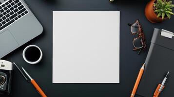 flat lay of blank sheet of white paper on desk with office supplies photo