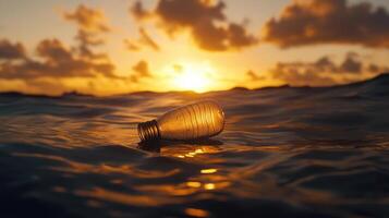 A light bulb floating in the ocean at sunset photo
