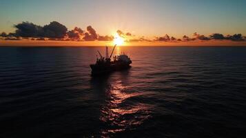 ship at sunset on ocean, creating serene and beautiful scene photo