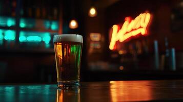glass of refreshing beer with bright golden hue in bar setting photo