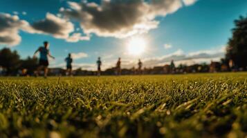 High energy summer sports event on sunny field with players photo