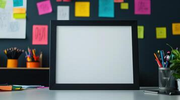 Blank frame mockup on desk with colorful post-it notes photo