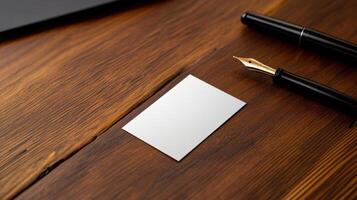 Business card mockup on wooden desk photo